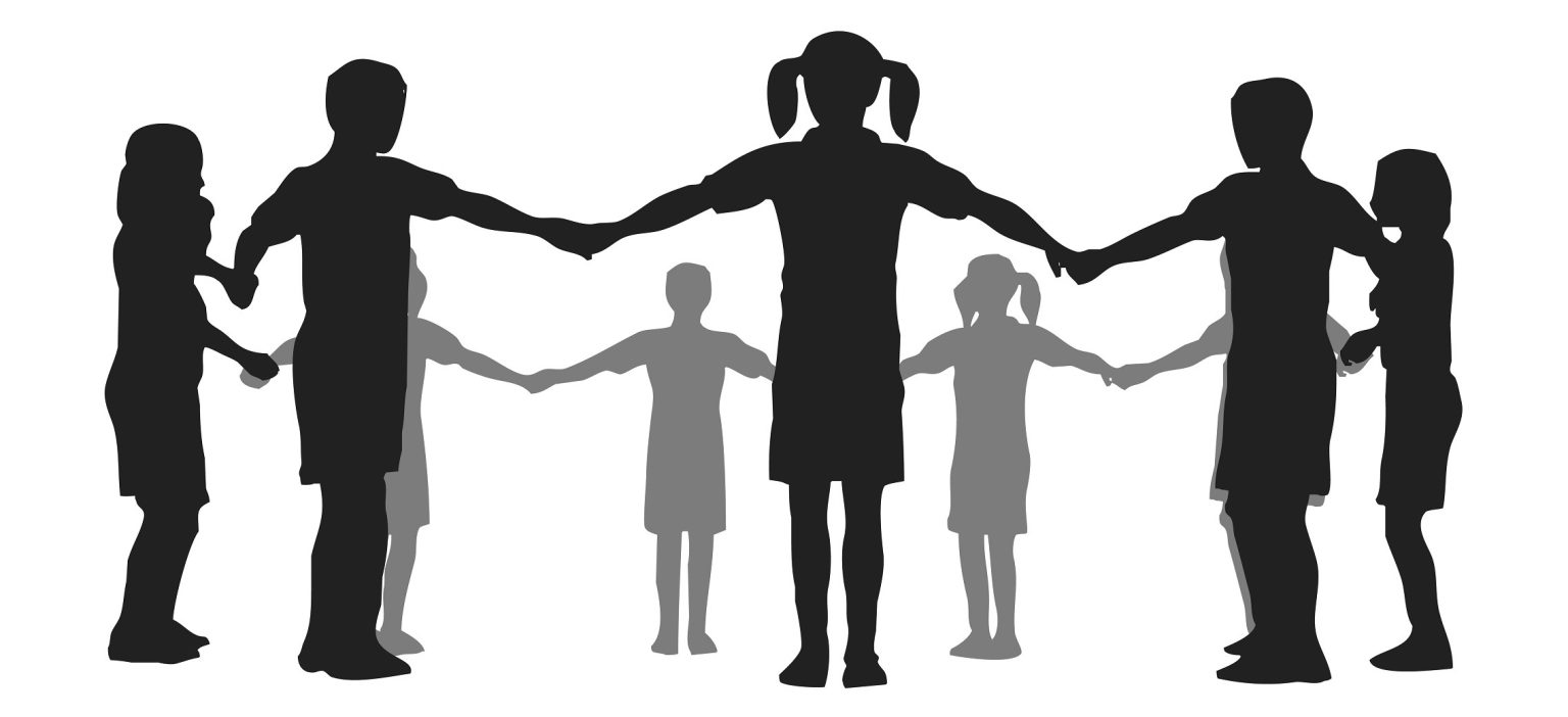 Children holding hands in a circle